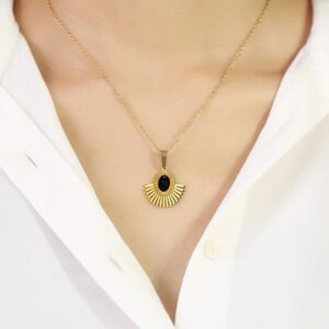 Iraasa Jewellers Sunburst Pendant Necklace—a gold-plated chain featuring a black oval stone in a radiant sunburst design.
