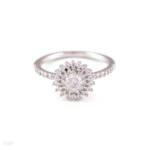Elegant silver ring with a diamond centerpiece.